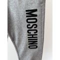 Unisex teplákové nohavice s logom sivé MOSCHINO
